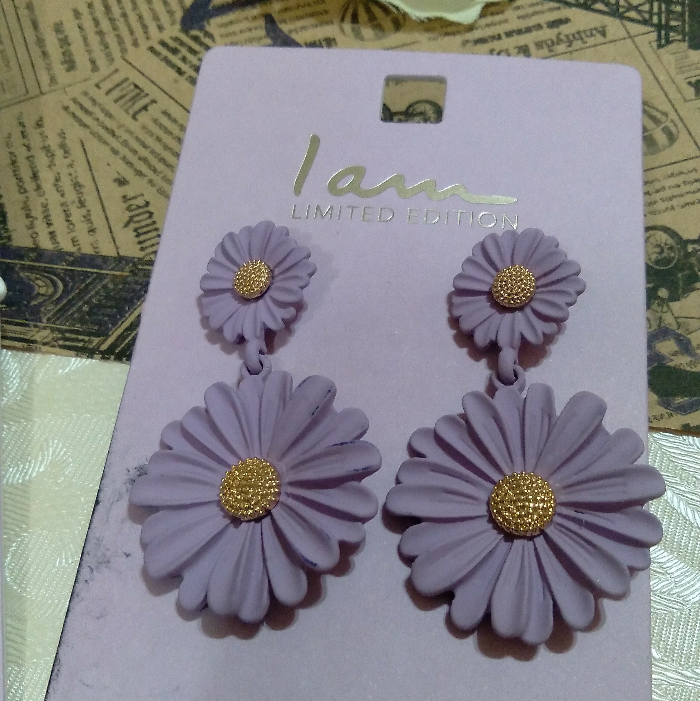 گوشواره بابونه بنفش