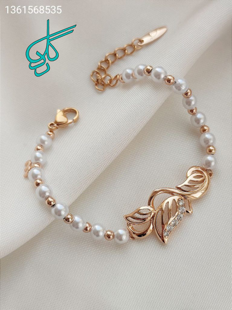 خرید دستبند طرح مرواریدی رنگ ثابت مارک ژوپینگ کد 1215332 - ردگل