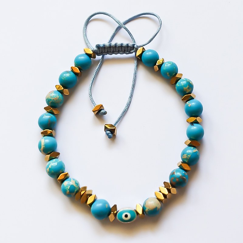 دستبند مدل حوض فیروزه ای با سنگ های فیروزه و هماتیت و پلاک چشم نظر مناسب همه