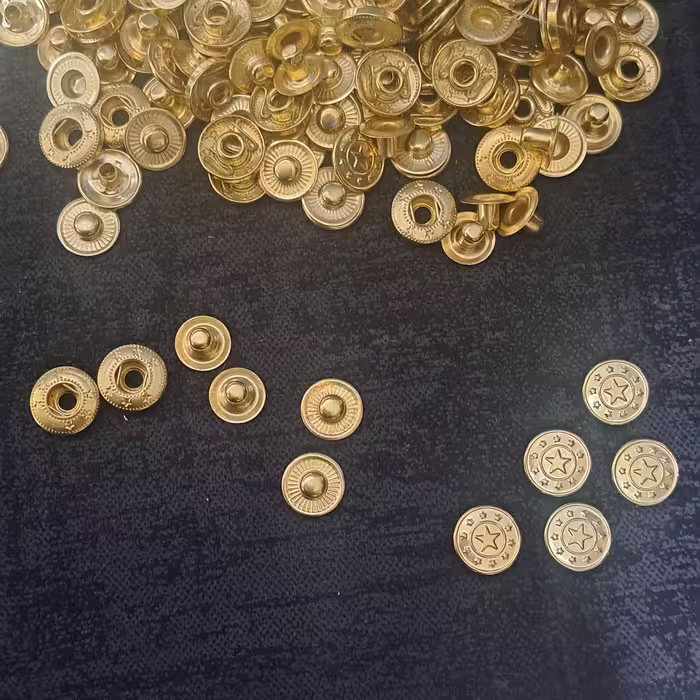 دکمه چهارپارچه الفا رنگ طلایی طرح ستاره  بسته 100 عددی
