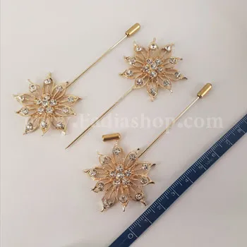 گل سینه نگین دار طلایی