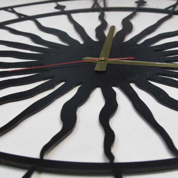 ساعت دیواری مدل خورشید - فروشگاه نیم آستین