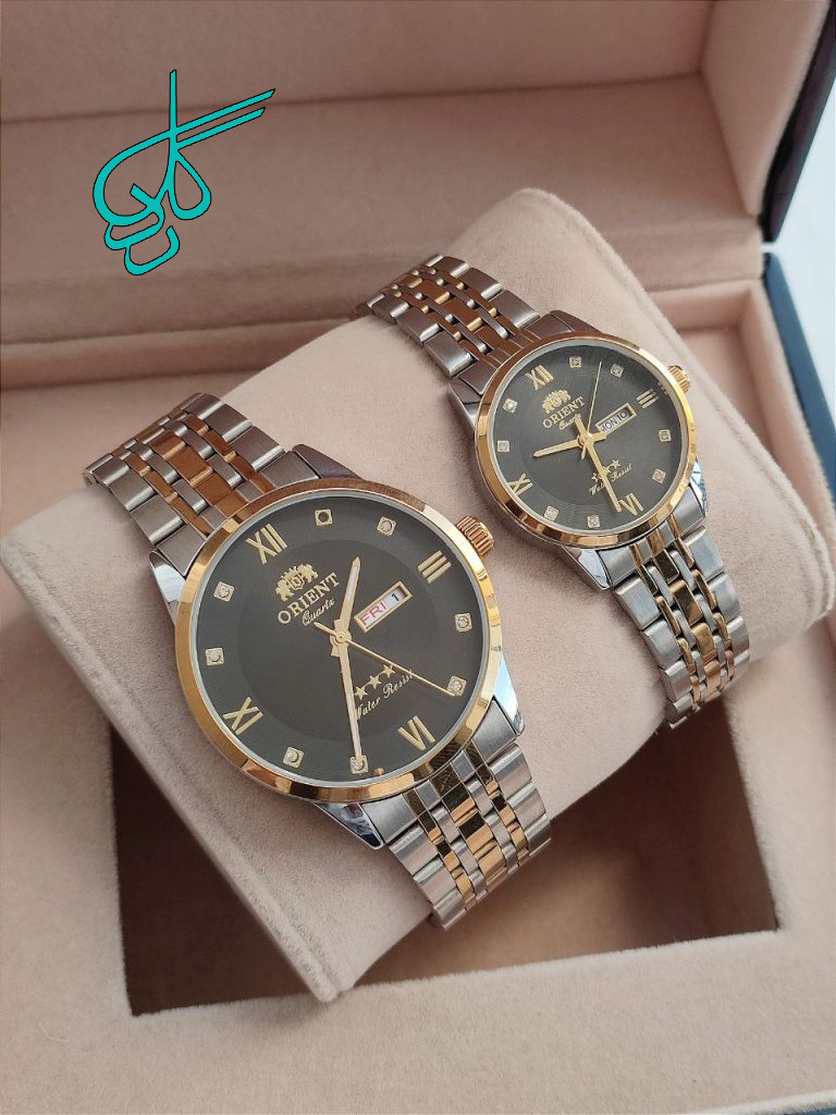 خرید ست ساعت مردانه زنانه اورینت تقویم دار رنگ ثابت دارای قفل ضامن دار دارای رنگ بندی متنوع کد 2115679 - ردگل