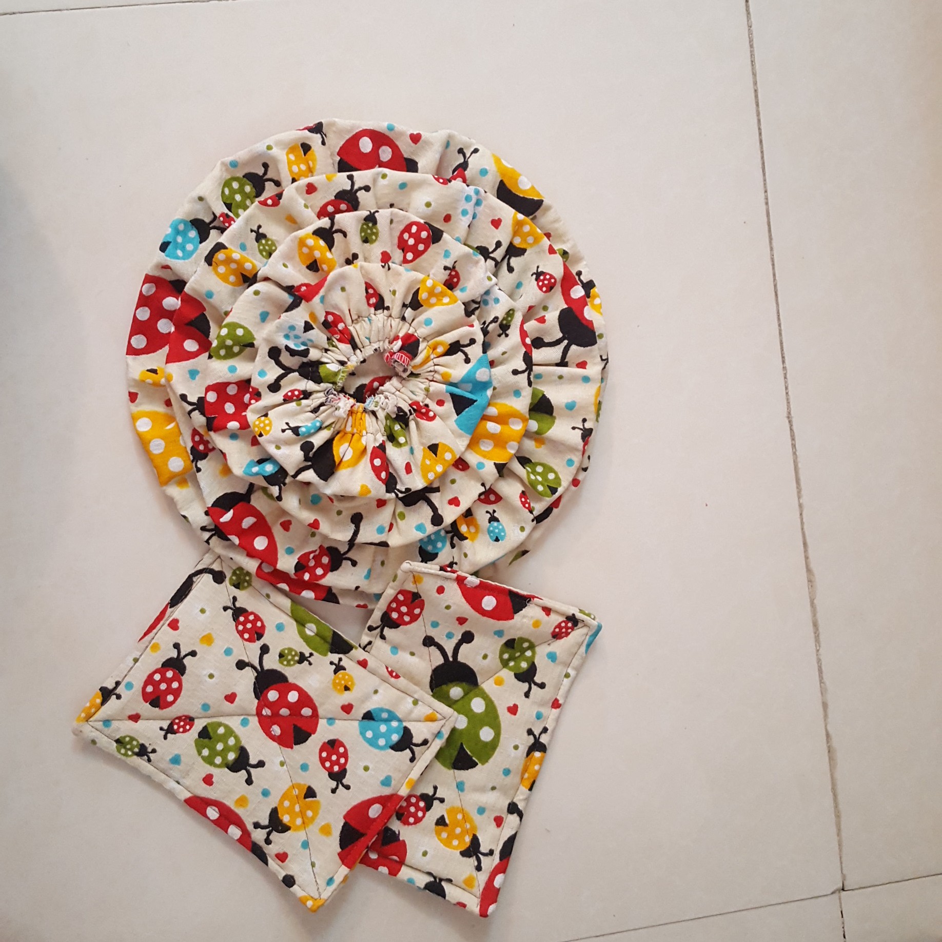 ست دمکنی و دستگیره 6 تیکه مدل بقچه ای جنس خنی 