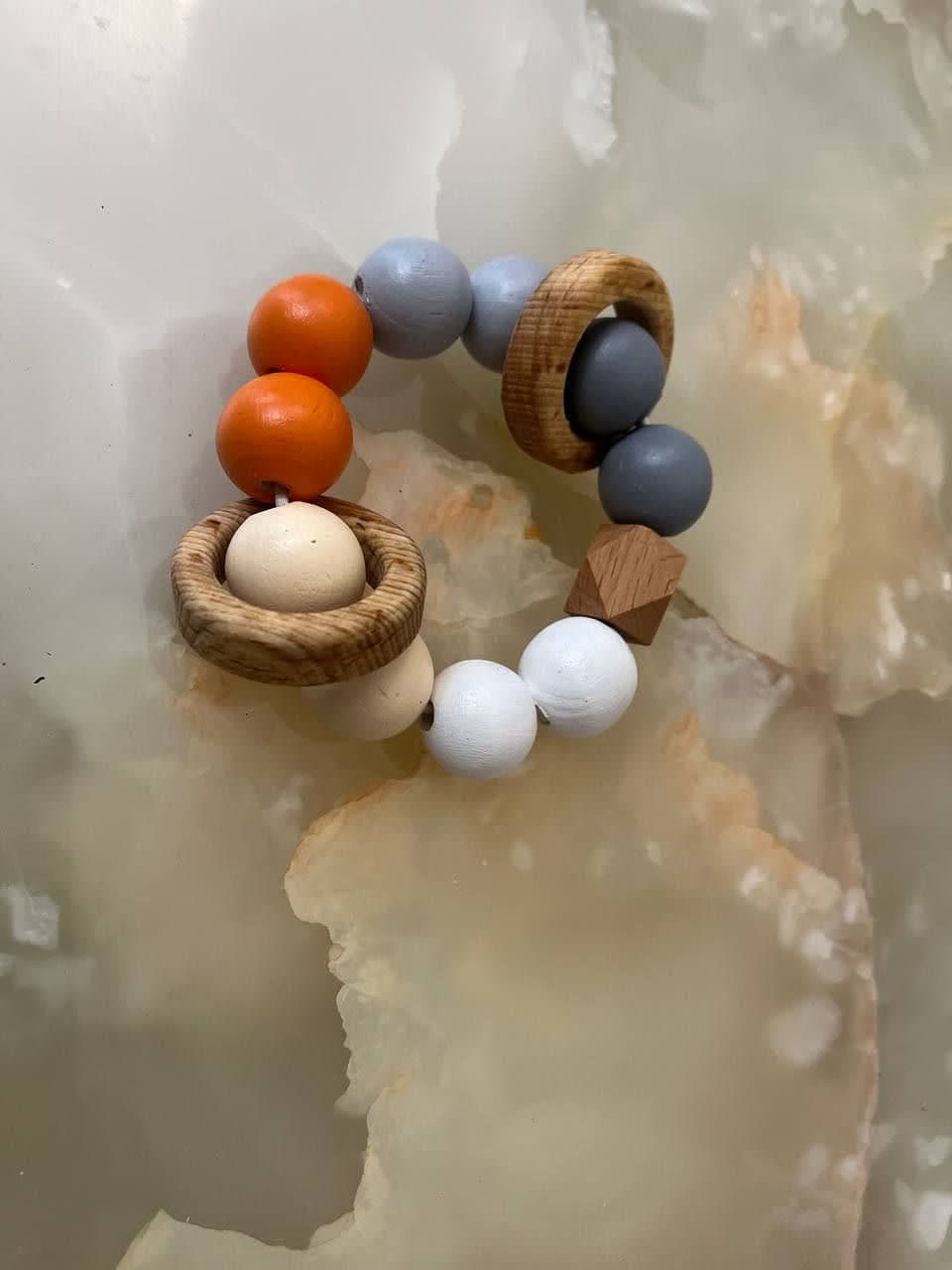 جغجغه مهره رنگی و حلقه چوب راش