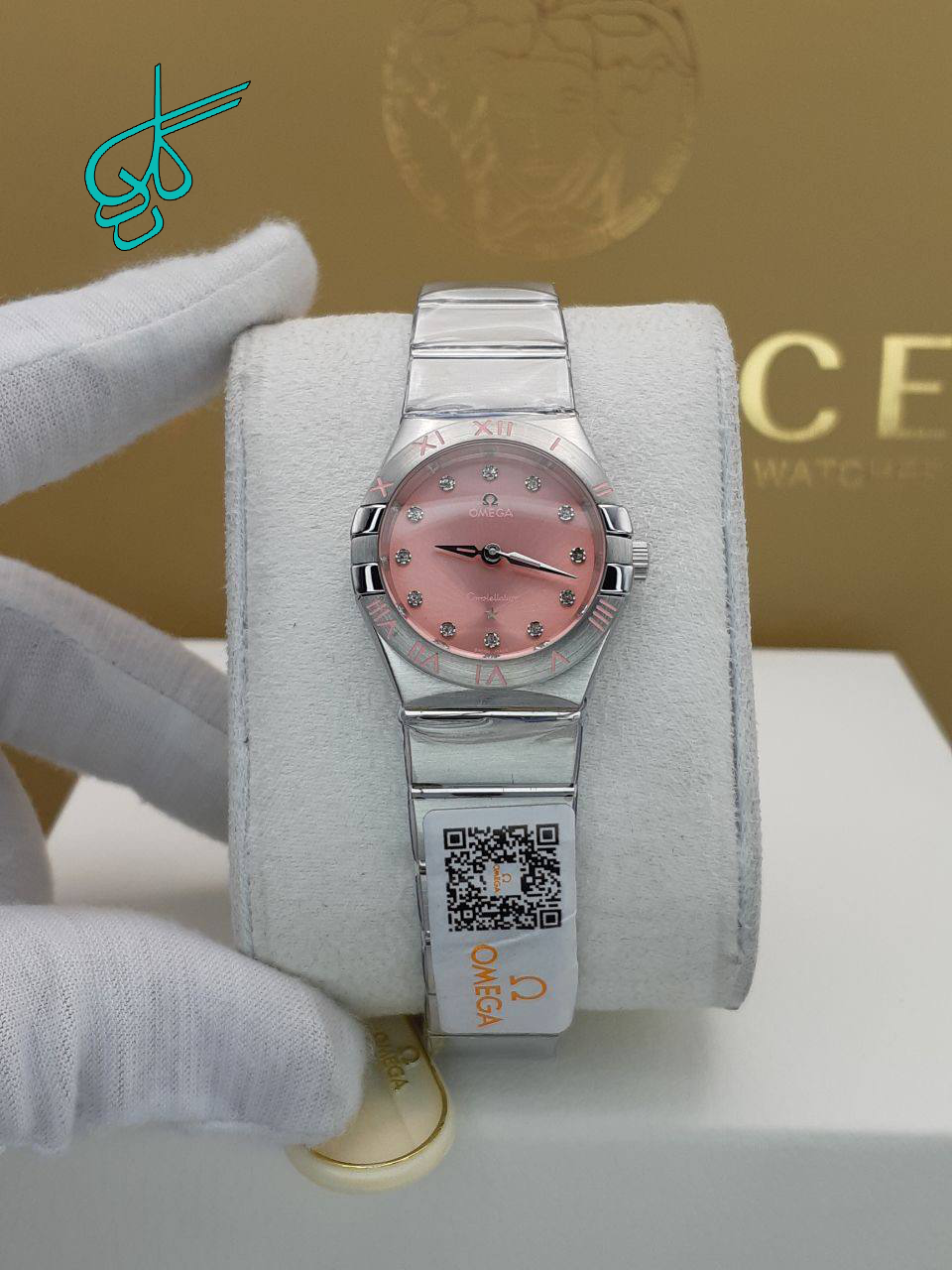 خرید ساعت زنانه امگا موتور ژاپن کوراتز جنس استیل رنگ ثابت و ضد حساسیت شیشه کریستال سافایر معدنی ضدخش سایز قاب 31 میلیمتر ضدآب ایندکس نگین دار کد 1918141 - ردگل