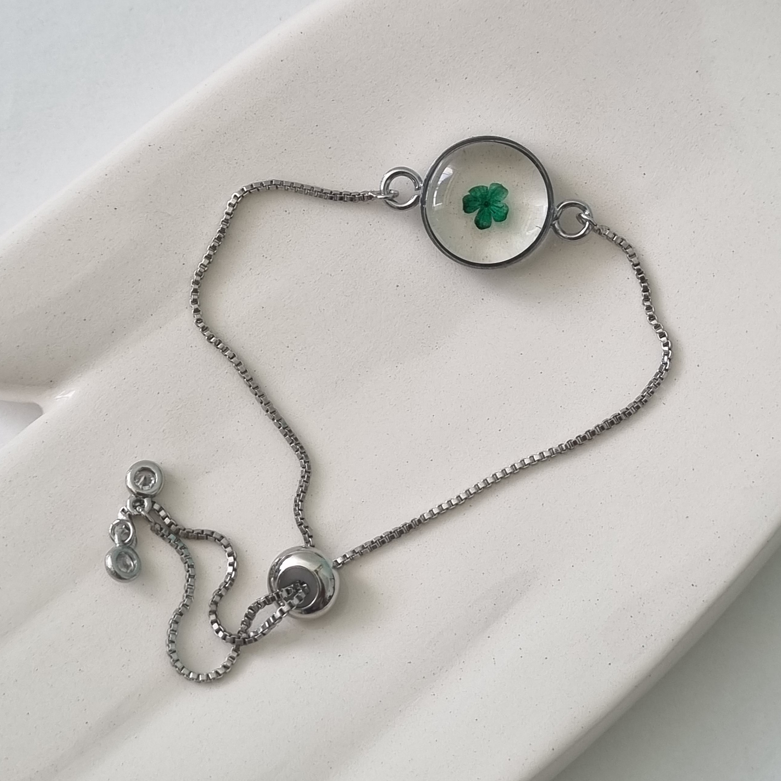 دستبند گل طبیعی آفتاب با بند فری سایز آسانسوری جنس استیل رنگ ثابت