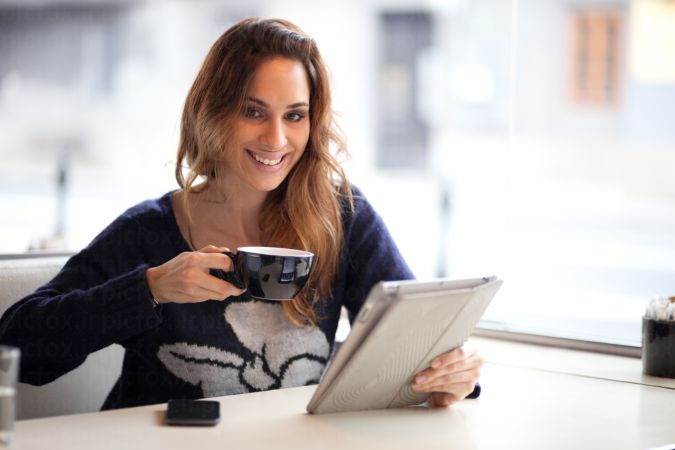 خرید و دانلود عکس Happy young woman drinking coffee کد 25020 | پیک فاکس | Pic Fox