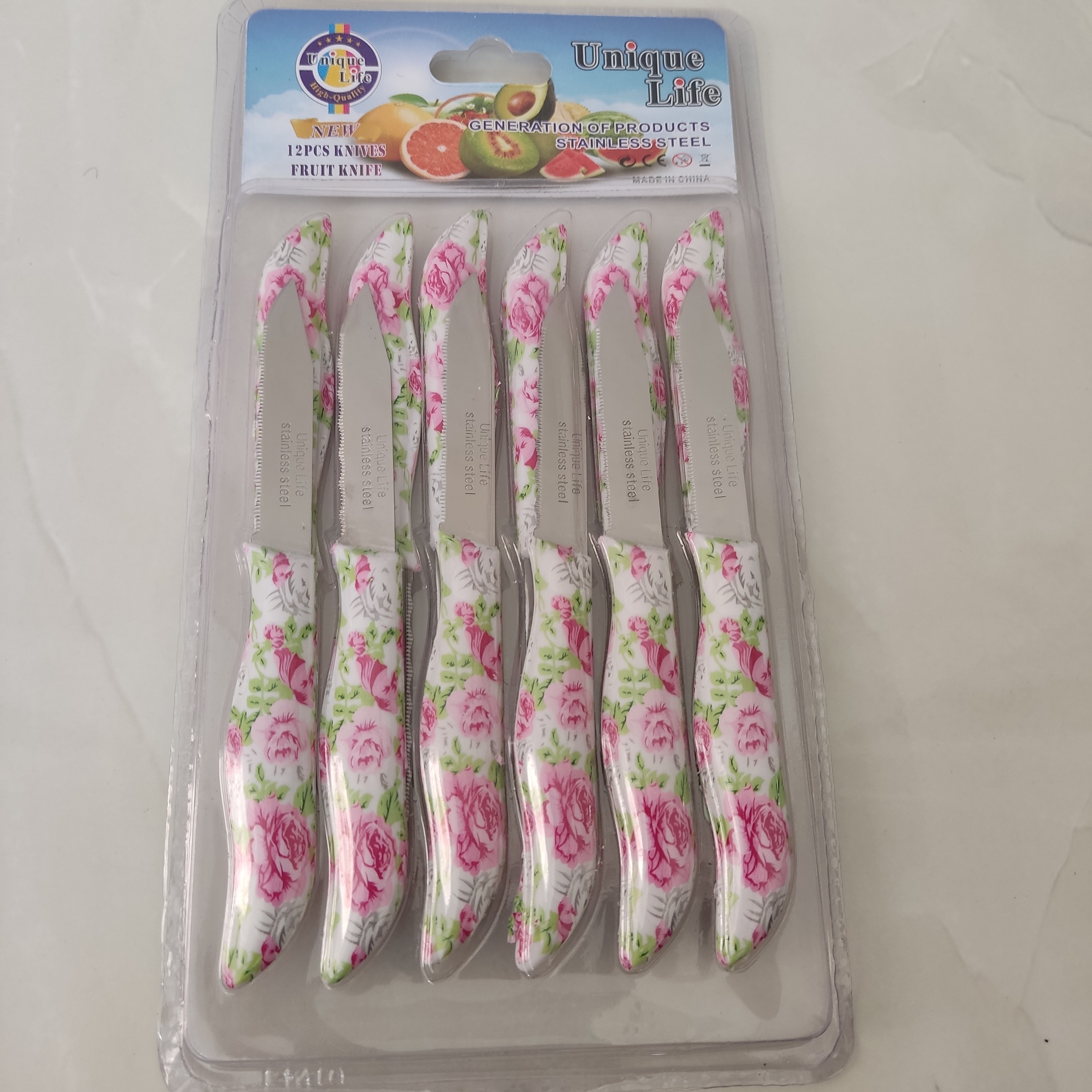 چاقو میوه خوری 12عددی اره ای مارک یونیک لایفUnique life رنگ صورتی (کارد ) تیغه ثابت طول16 سانت.  