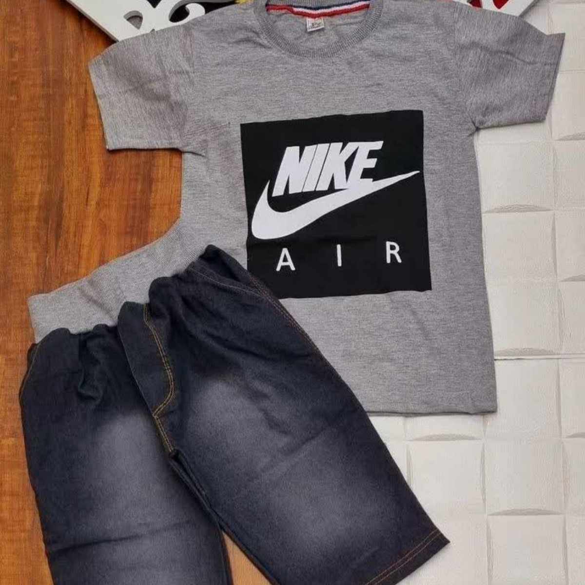 ست تیشرت شلوارک پسرانه جنس تیشرت ملانژ   جنس شلوارک لی کاغذی با کیفیت و تضمینی    سایزبندی 50 55 60  