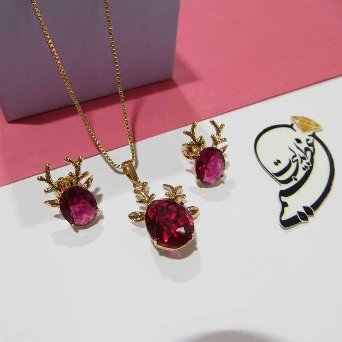 نیم ست برند Xuping از جنس مس و روکش طلا بسیار با کیفیت طرح گوزن و نگین آلبالویی و زرشکی ظریف کاملا مشابه طلا