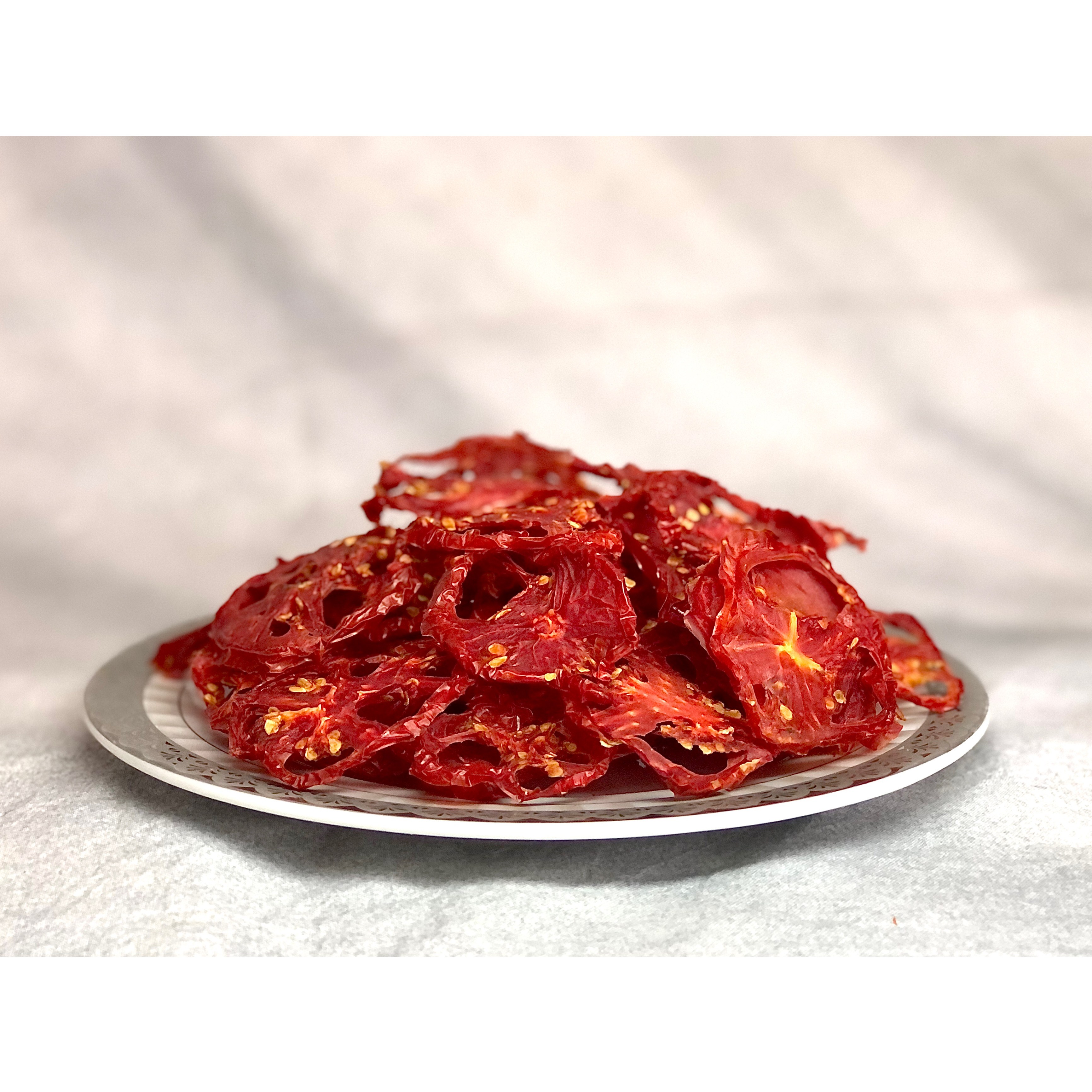 گوجه محلی خشک( بسته های 100 گرمی)