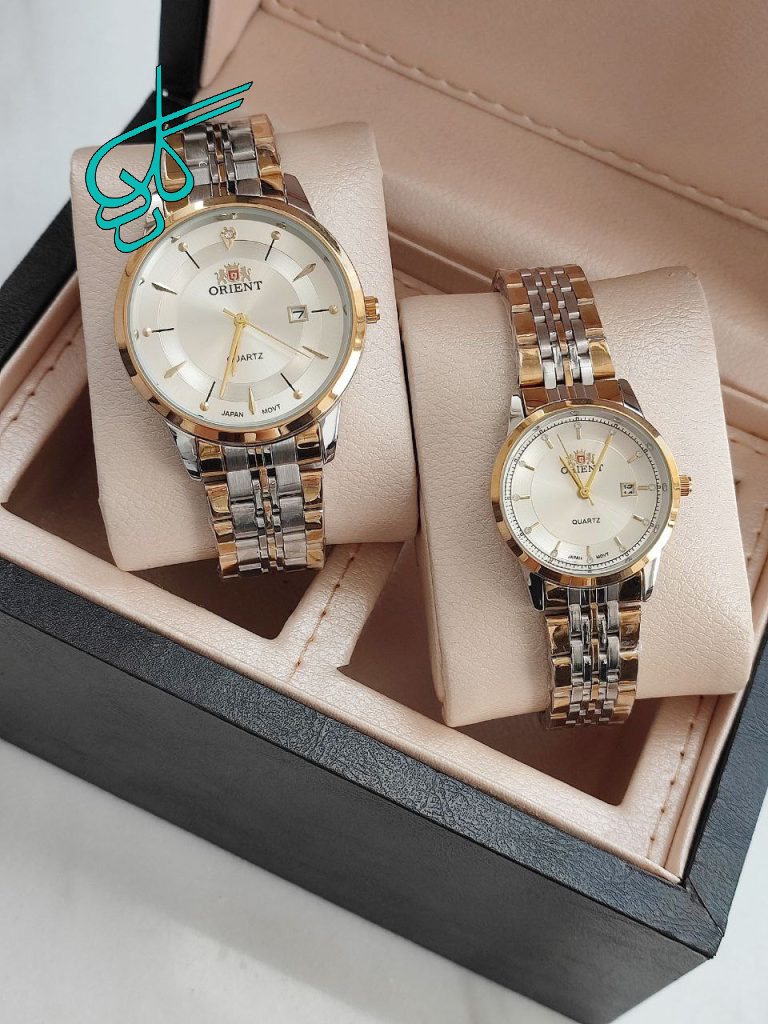 خرید ست ساعت زنانه و مردانه اورینت فلزی رنگ ثابت تقویم دار دارای قفل ضامن دار کیفیت عالی دارای رنگبندی کد 2116771 - ردگل