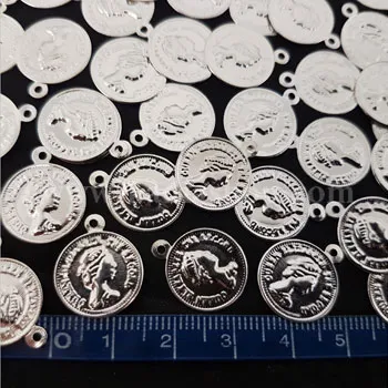 سکه دوختنی نقره ای طرح دار