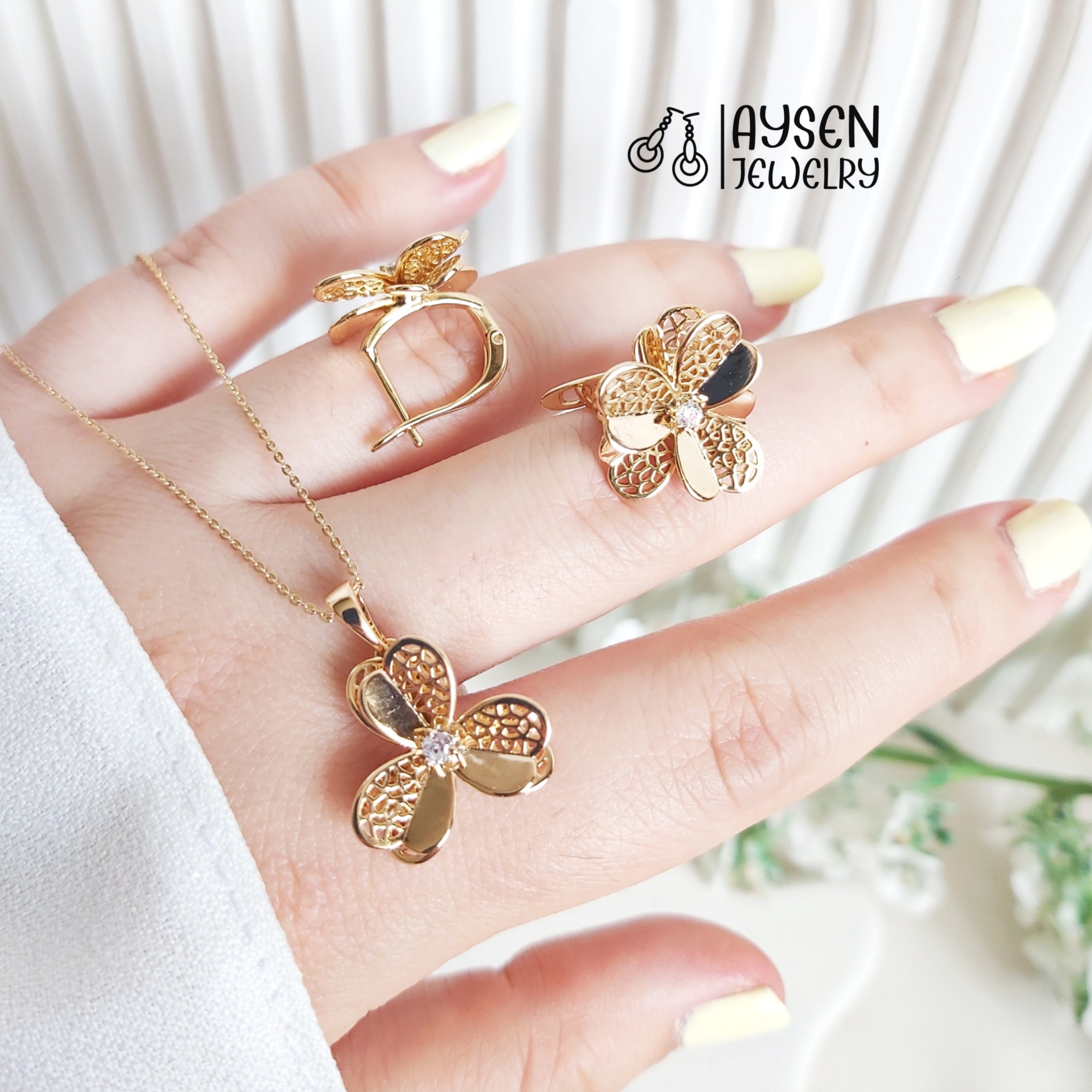 نیم ست  ژوپینگ طرح گل مشابه طلا 