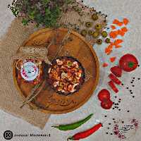 ترشی خانگی  اب گوجه (مشهدی) 400 گرمی صد در صد طبیعی و بدون مواد افزودنی