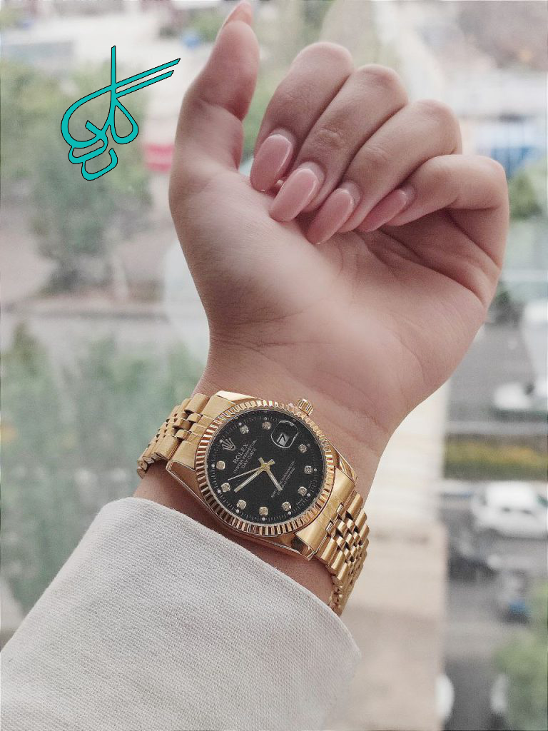 خرید ست ساعت مردانه وزنانه رولکس تقویم دار رنگ ثابت دارای قفل ضامن دار کیفیت عالی کد 2115680 - ردگل