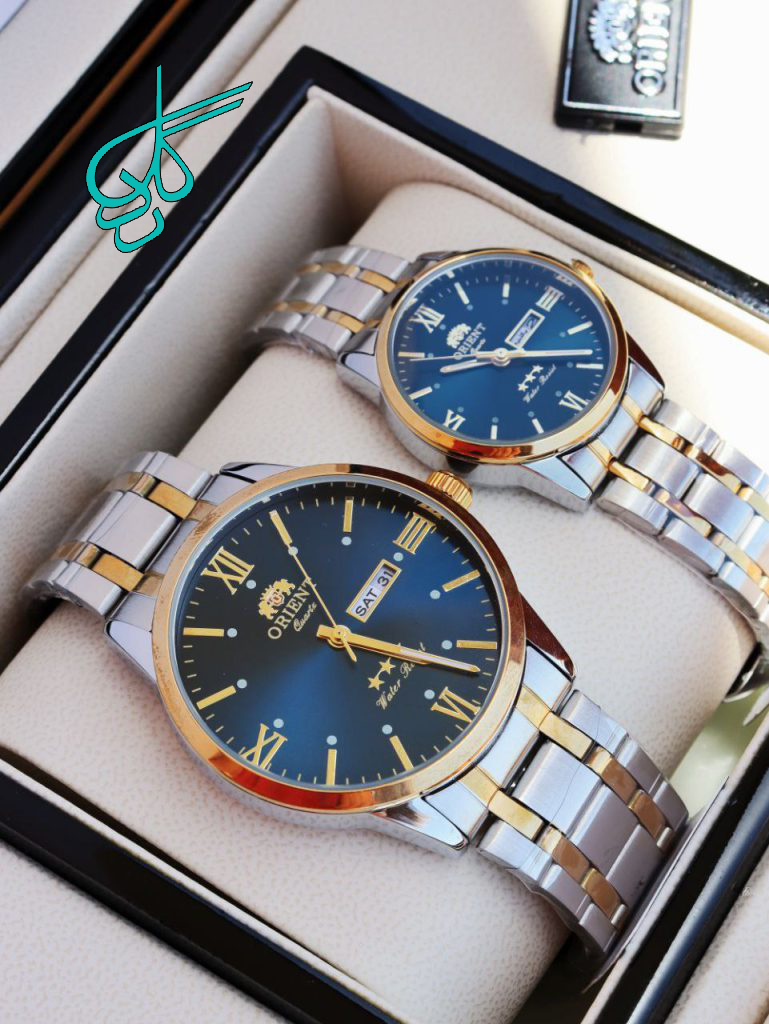 خرید ست ساعت زنانه و مردانه اورینت دارای تاریخ فارسی و انگلیسی رنگ ثابت ضد آب کد 2115774 - ردگل