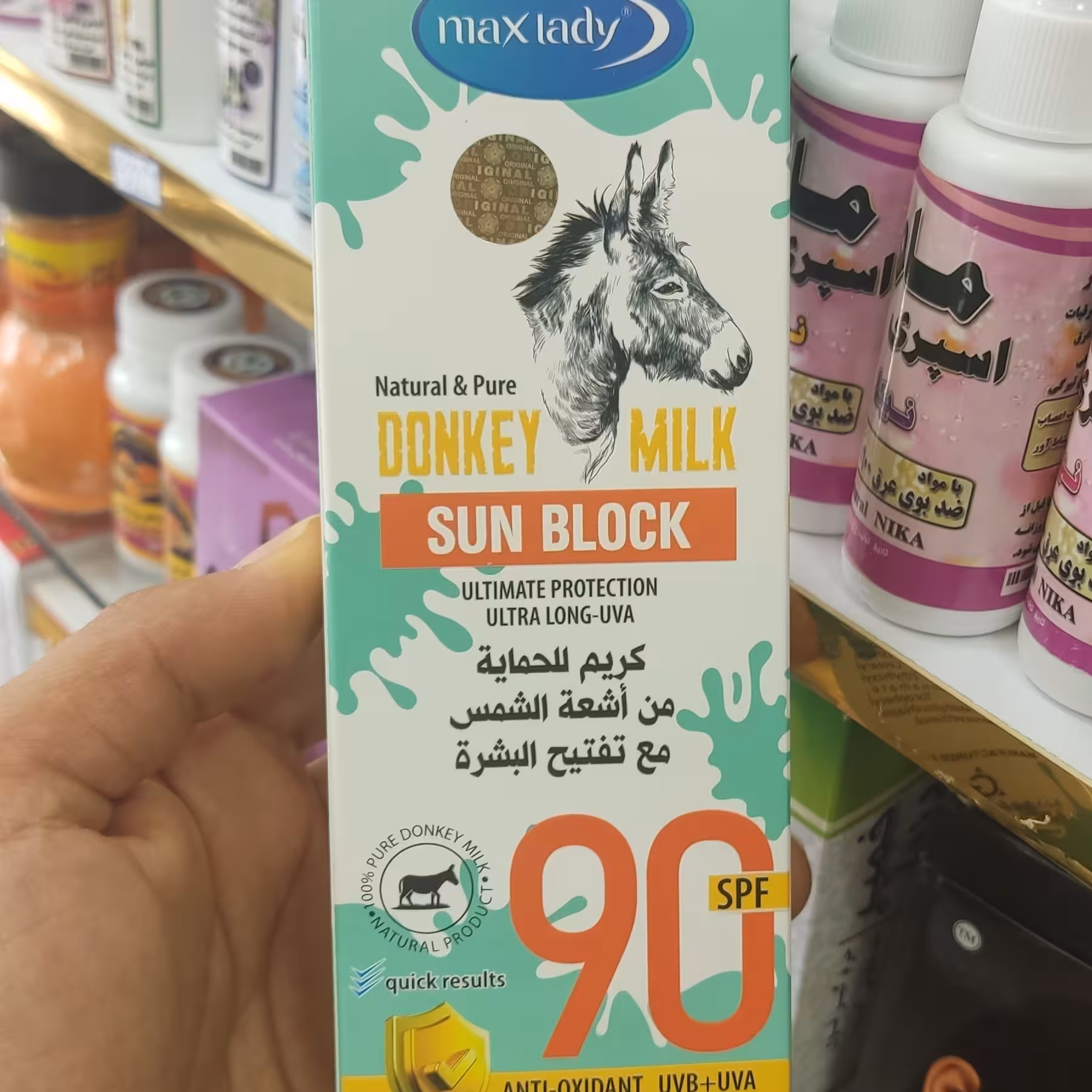 کرم ضد آفتاب بدون رنگ شیر الاغ، spf90