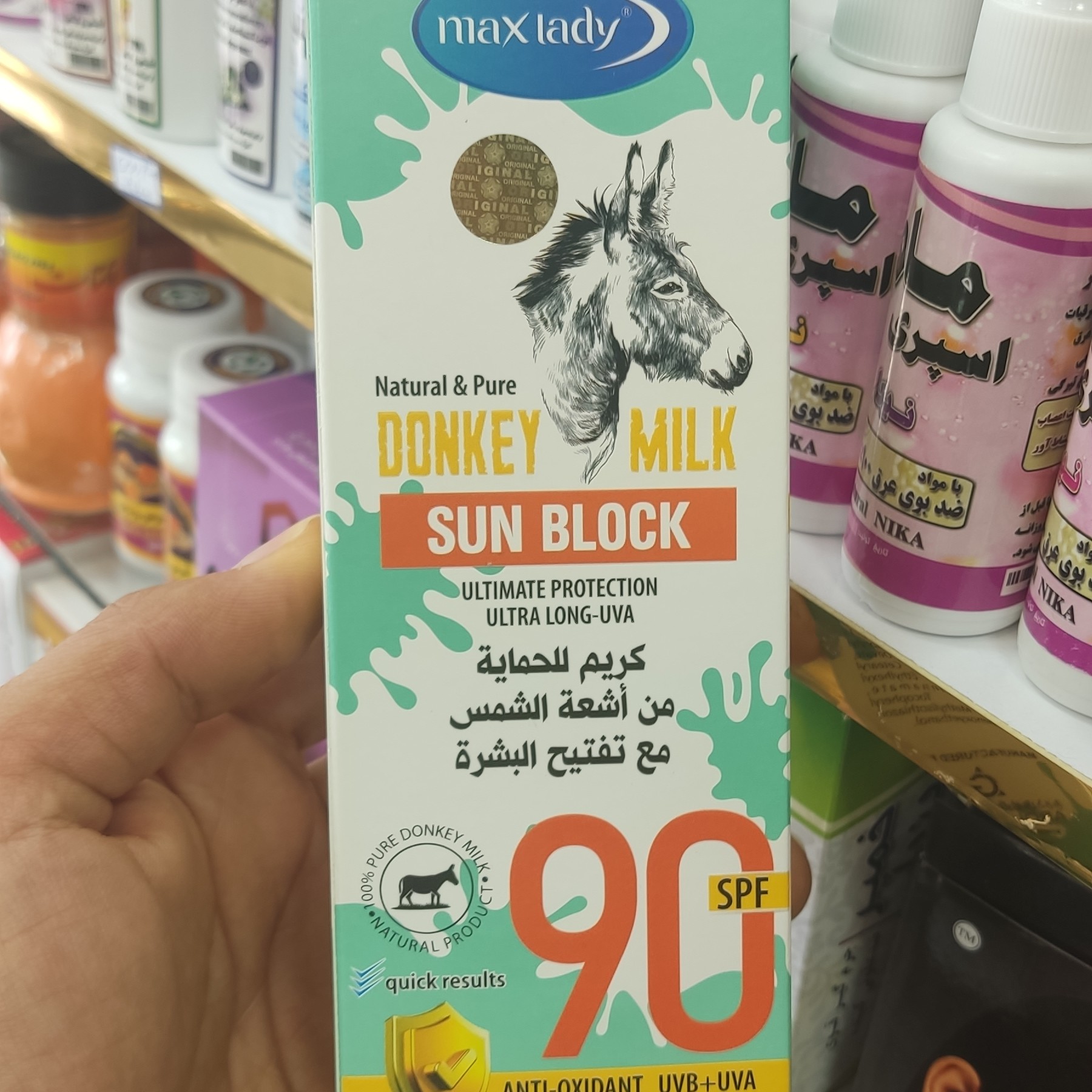 کرم ضد آفتاب بدون رنگ شیر الاغ، spf90