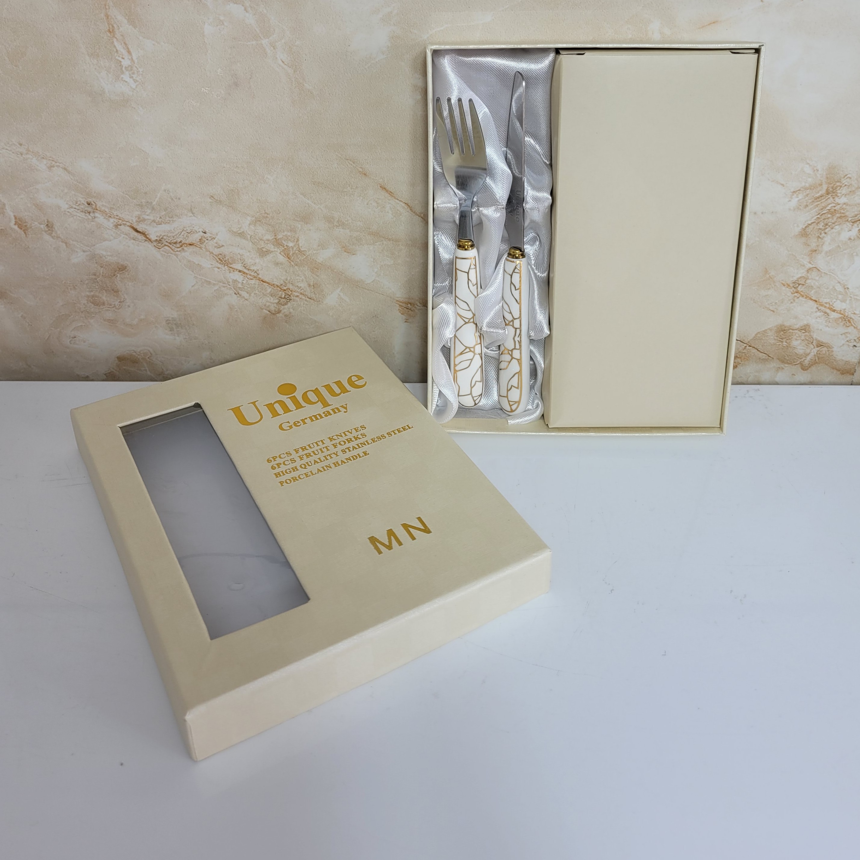 کارد و چنگال دسته سرامیکی 12 پارچه برند یونیک طرح سنگ 