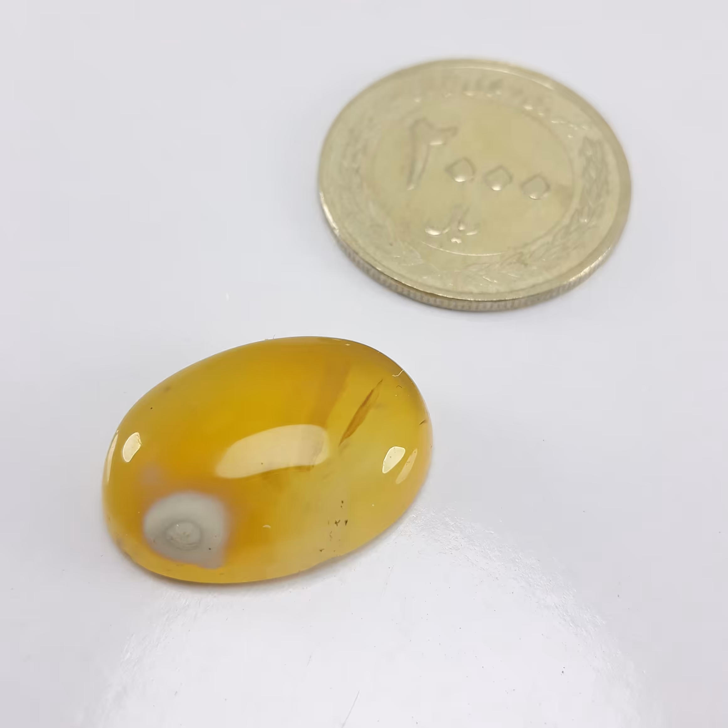 نگین عقیق زرد باباقوری دار 