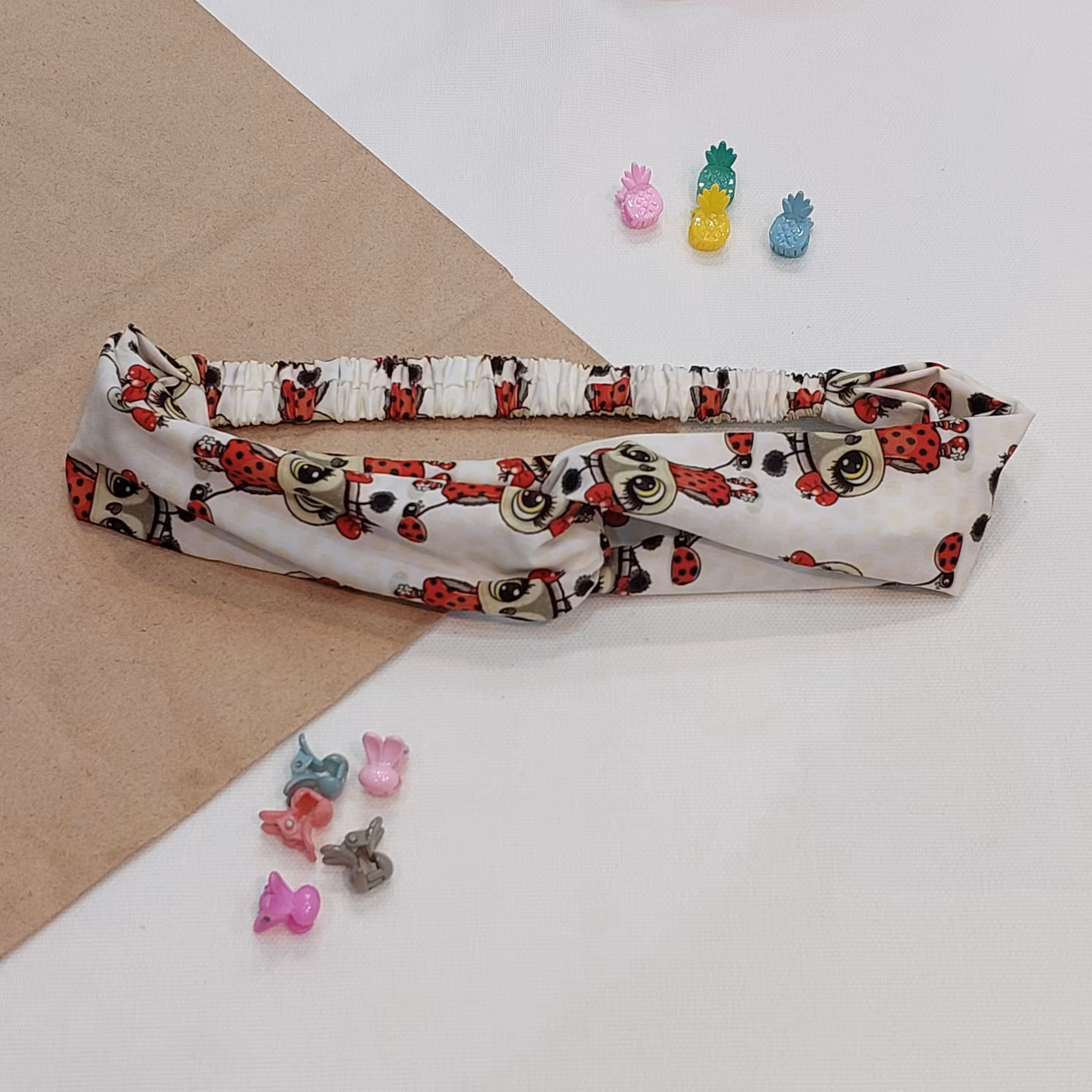 هدبند پارچه ای ( تل کشی ) طرح کفش دوزک . کفشدوزک