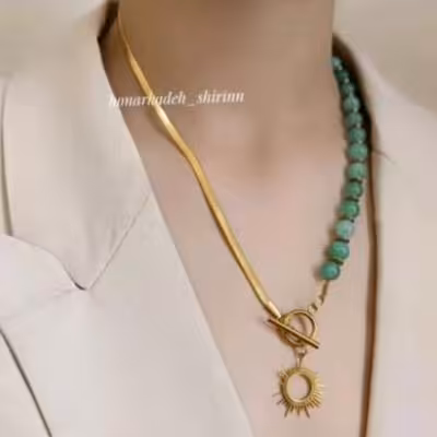 ست گردنبندو گوشواره سنگ جید و سنگ حدیدبا آویز خورشید و قفل تی وزنجیر م