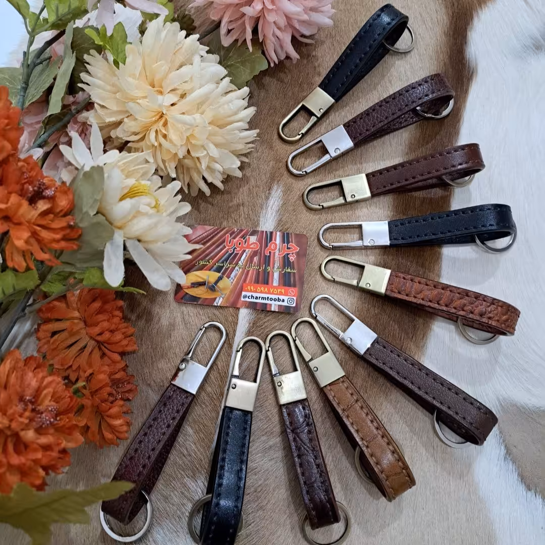 جاکلیدی طرح کتابی چرم طبیعی گاوی دستدوزی شده دارای رنگ لبه 