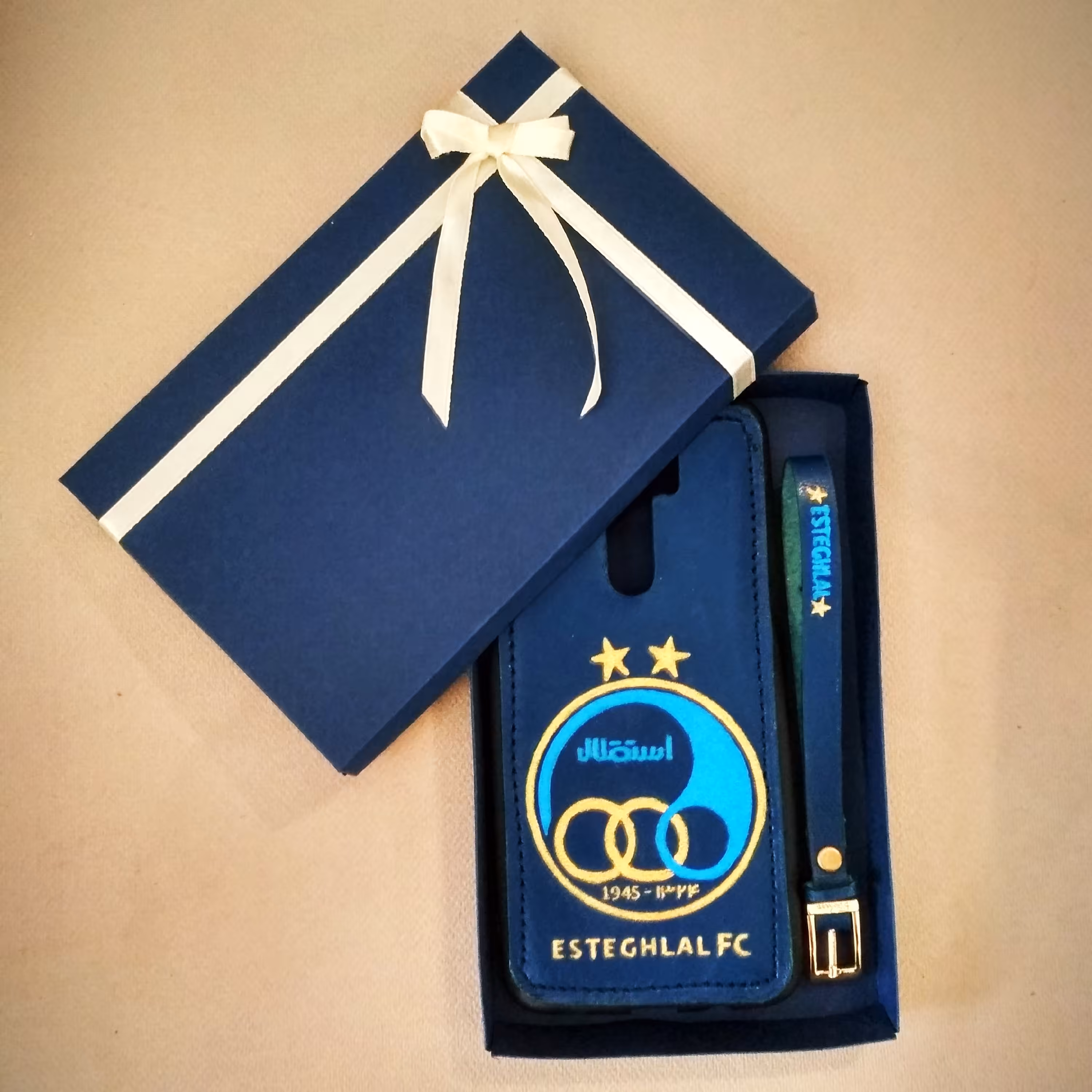 ست قاب ( گارد ) گوشی و دستبند چرم با آرم استقلال