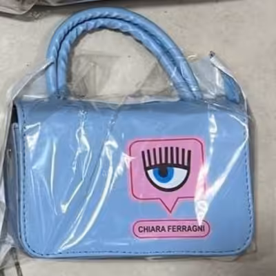 کیف زنانه دست چرم طرح چشم و مژه کد m93
