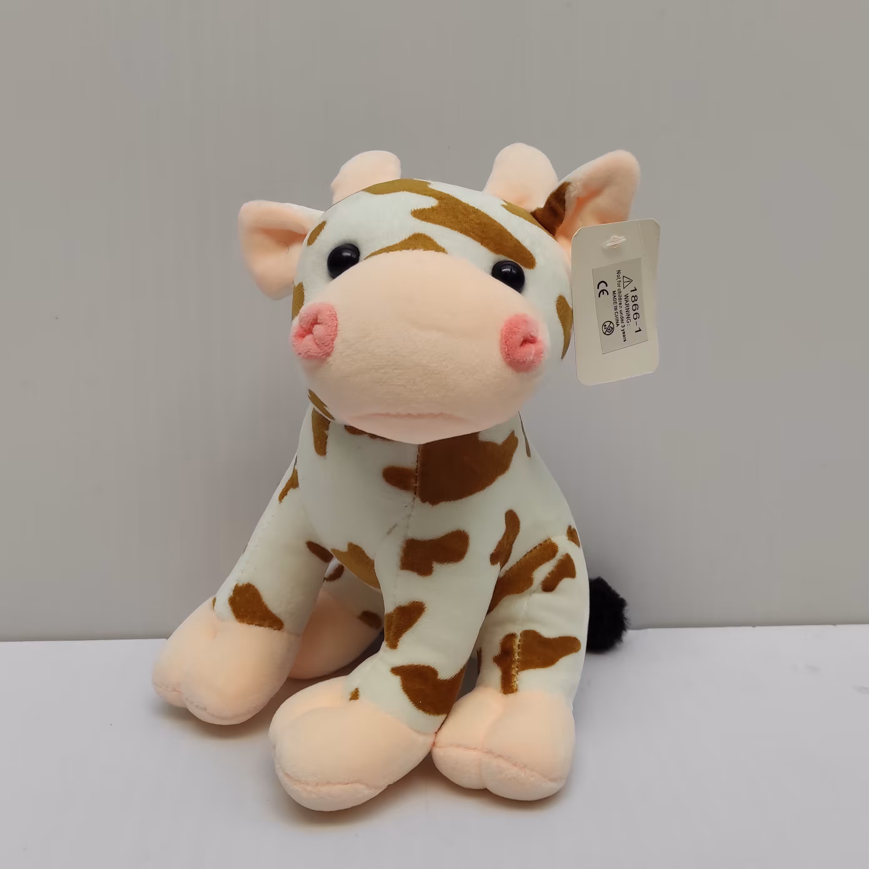 عروسک پولیشی گاو نشسته دو رنگ