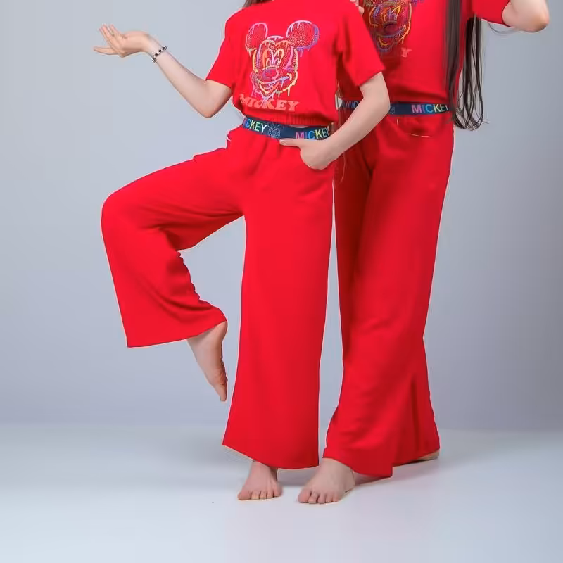 ست دخترانه شیک کراپ و شلوار بگ جنس ابروبادی عالی مناسب حدود سنی 5 تا 15 سال در 4 رنگ جذاب