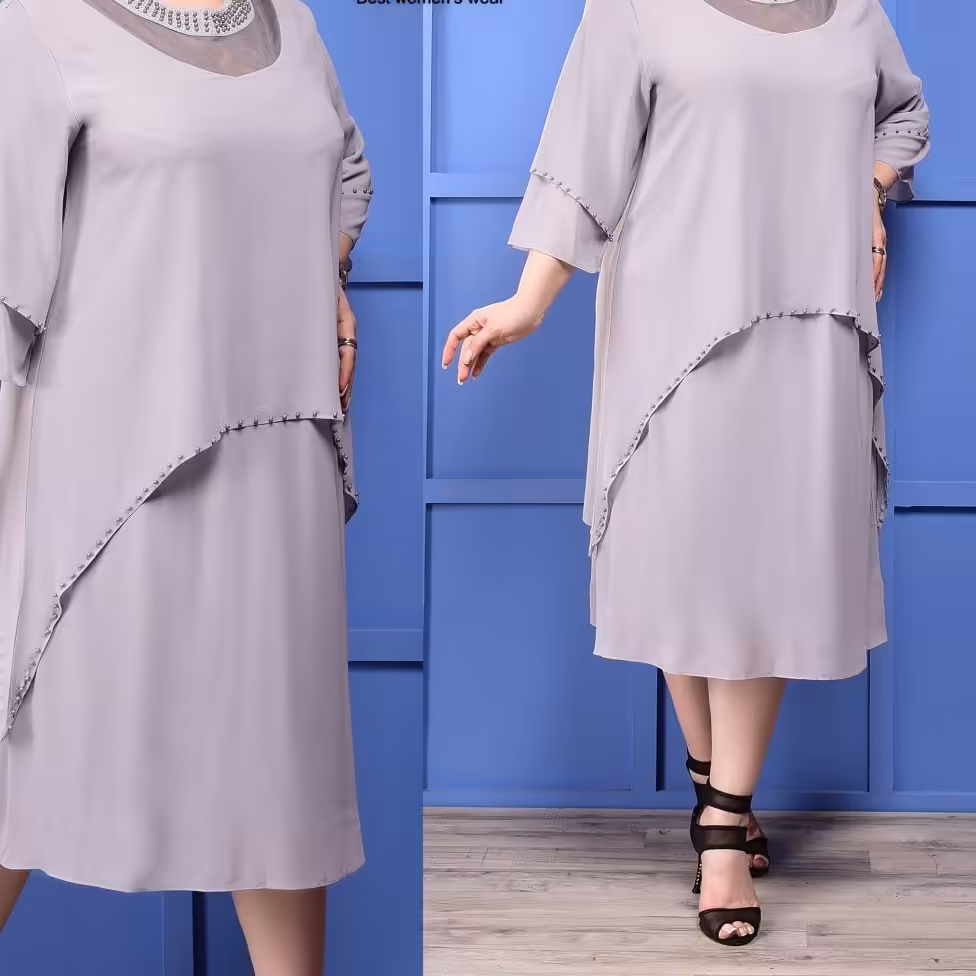 پیراهن مجلسی یقه تور و نگین دار
سایزبزرگ 48 تا 58