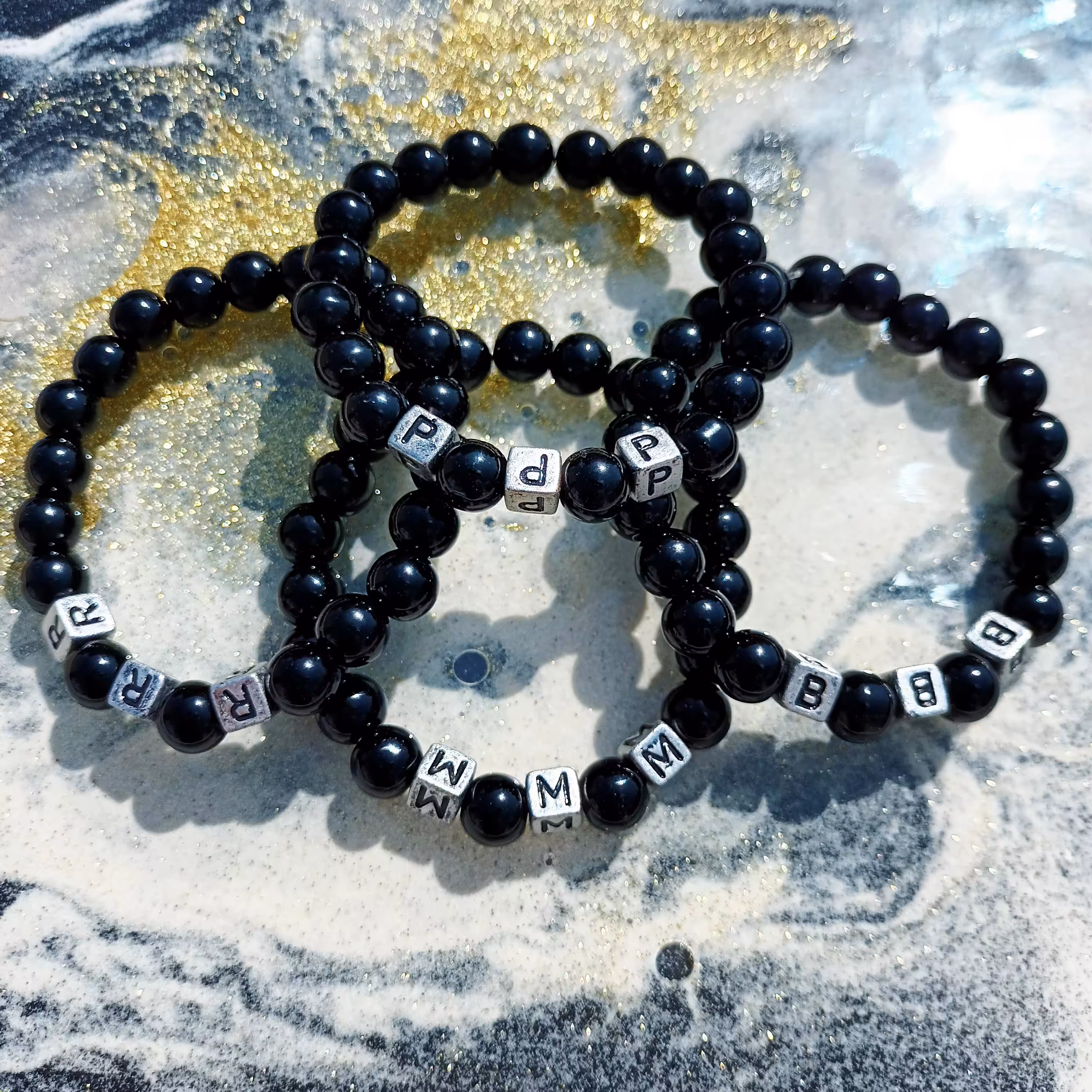 دستبند سنگ اونیکس حروفات 