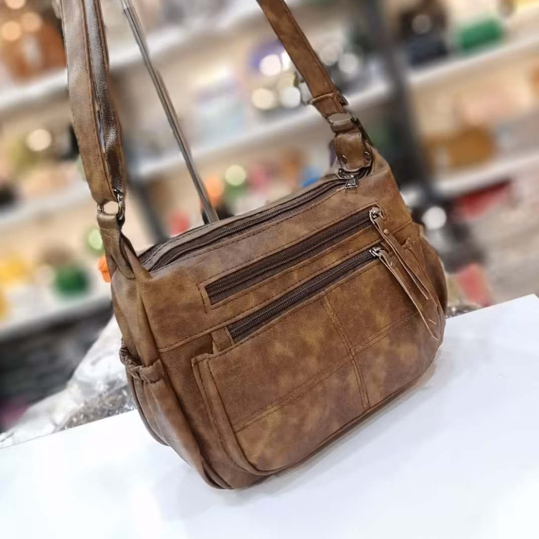 کیف دوشی دخترانه چرم شسته ترک