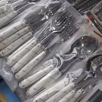 قاشق و چنگال دسته سرامیکی سفید 