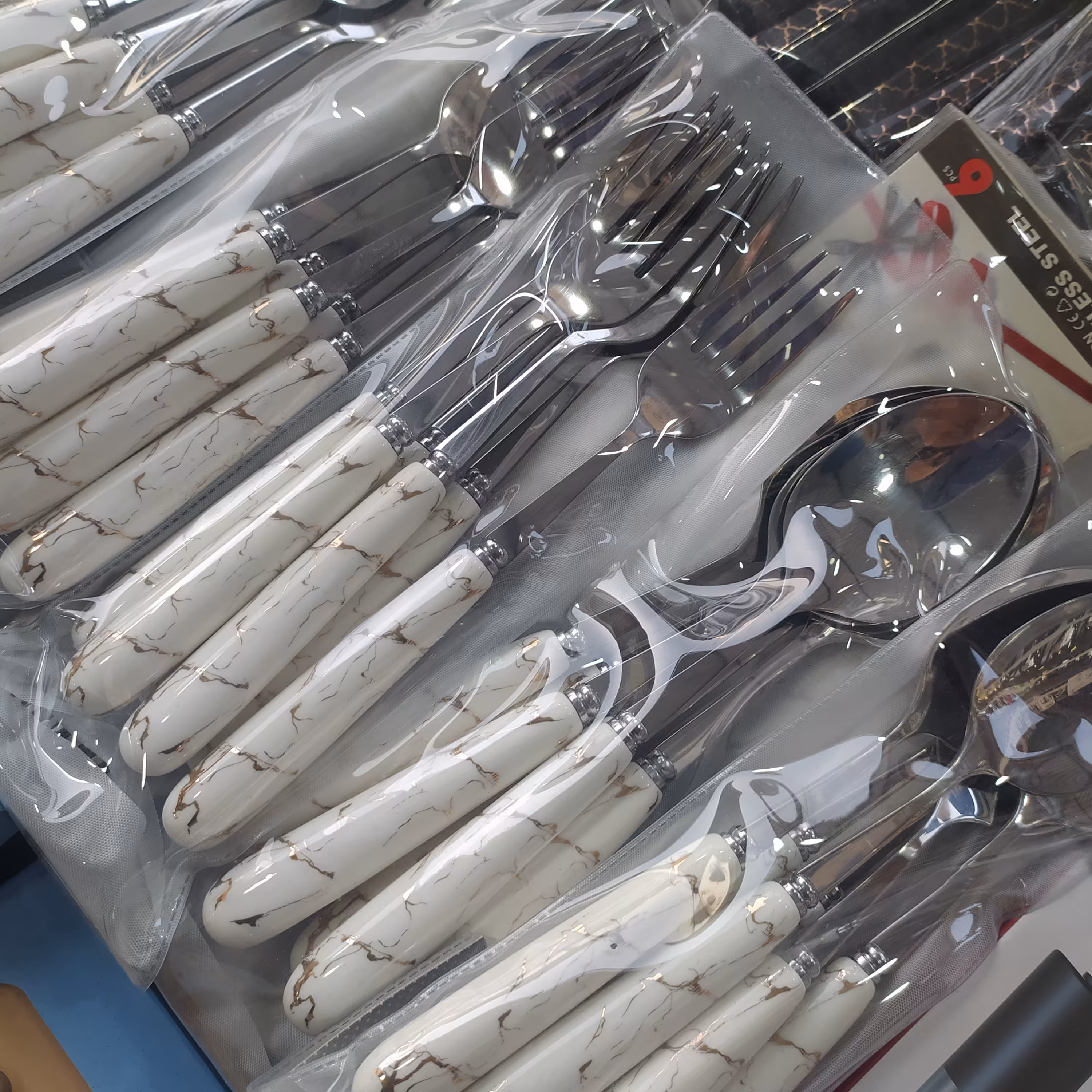 قاشق و چنگال دسته سرامیکی سفید 