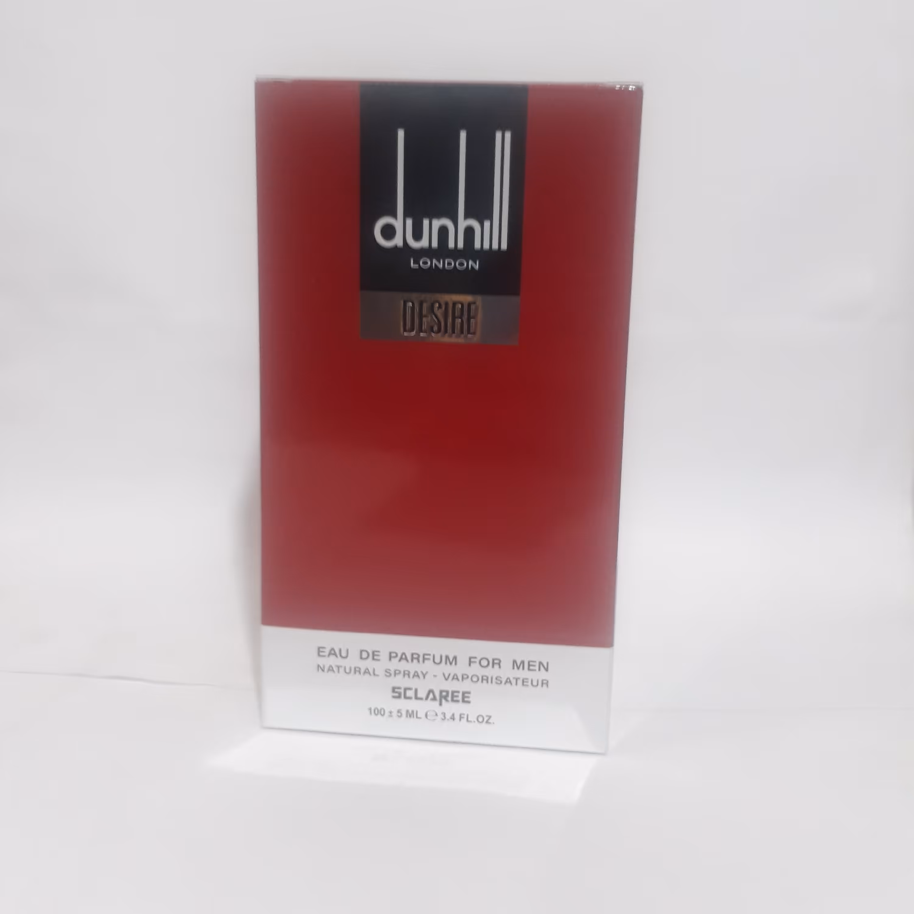 ادکلن 100 میل دانهیل دیزایر(Red) برند اسکلاره طرح شیشه اصلی مناسب آقایان با رایحه ای خاص