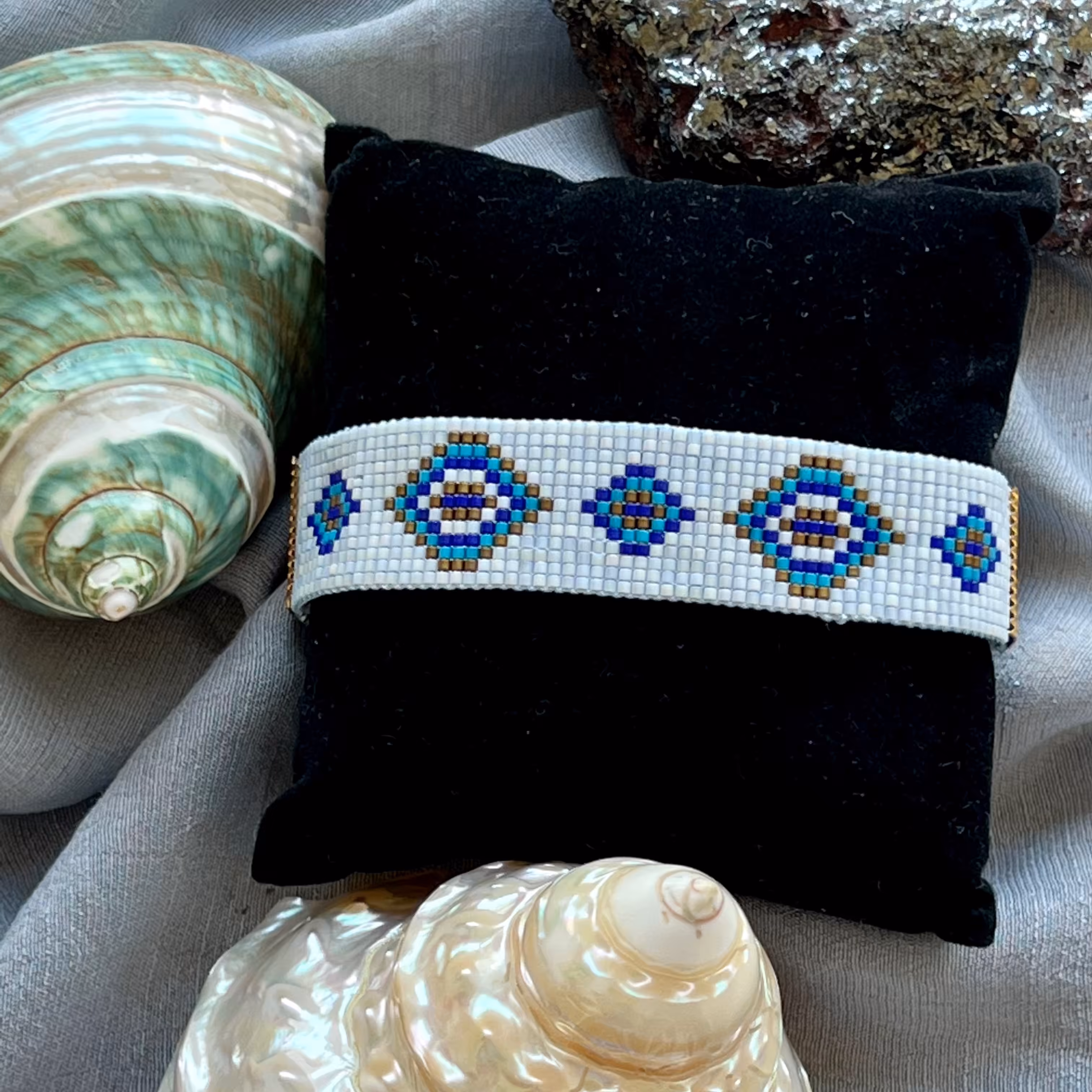 دستبند بافت دستگاهی میوکی طرح چشم نظر 1