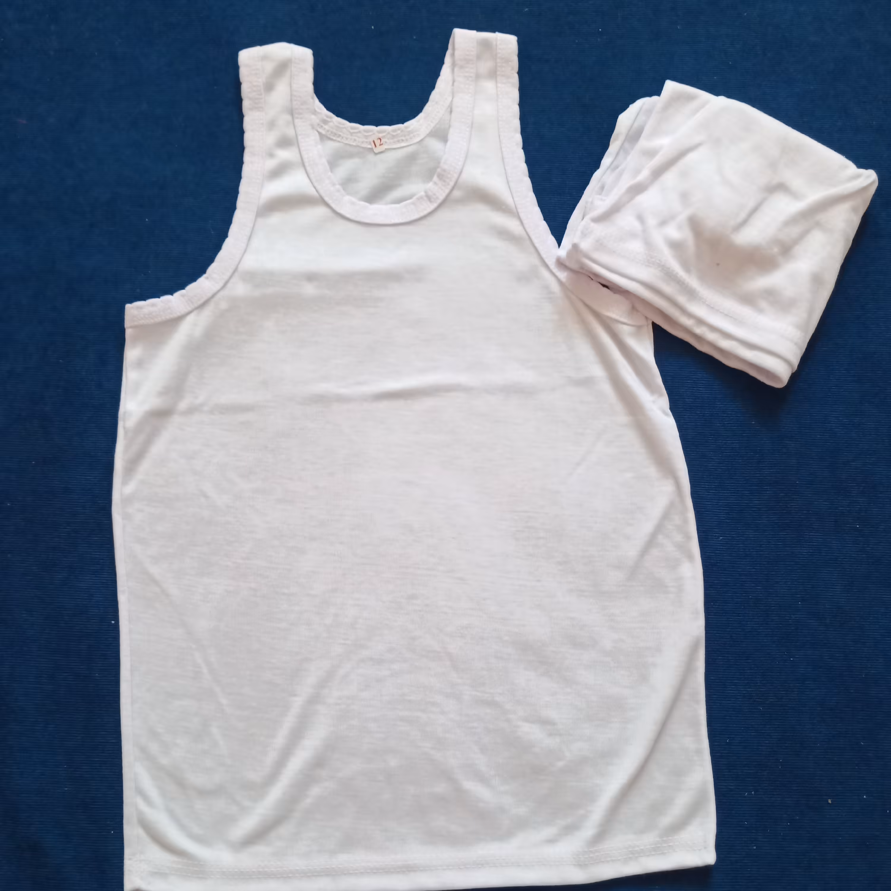 زیرپوش رکابی ساده سفید 7 تا 9 سال غرفه شیک باران  