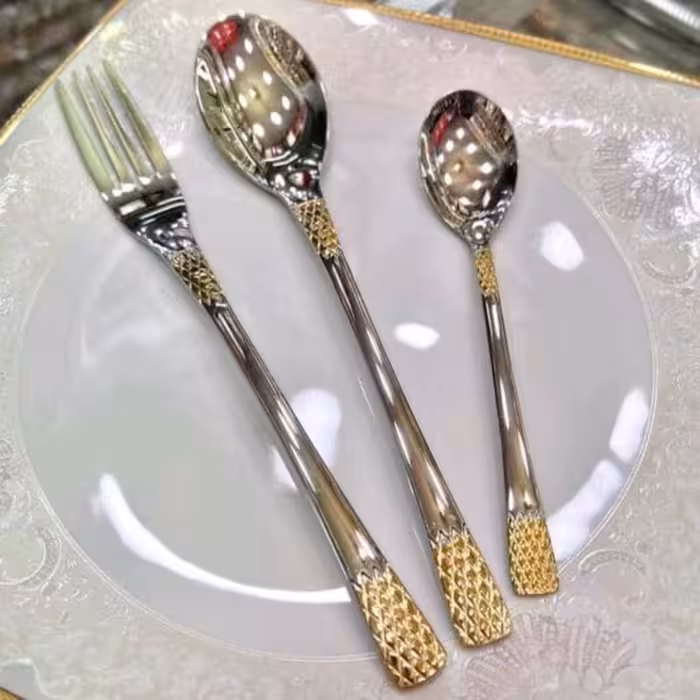 سرویس قاشق و چنگال نیمه طلایی یونیک دهانه اروپایی استیل نگیر (آناناسی)با ضمانت