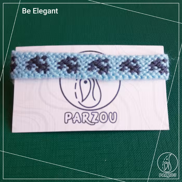 دستبند دوستی دو رنگ آبی و طوسی طرح لنگر