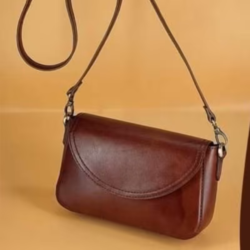 کیف یه وری زنانه دست دوز با چرم طبیعی ،سایز23در 14 ،رنگ عسلی ،قابل سفارش در رنگ دلخواه (پس کرایه)