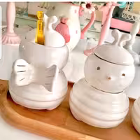 عسل خوری سرامیکی طرح زنبور همراه با قاشق عسل خوری ورنگ سفید