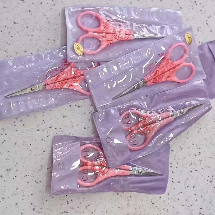 قیچی ابروی دسته صورتی  پک 12عددی 