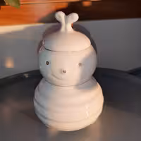 عسل خوری سرامیکی طرح زنبوری  به همراه قاشق 