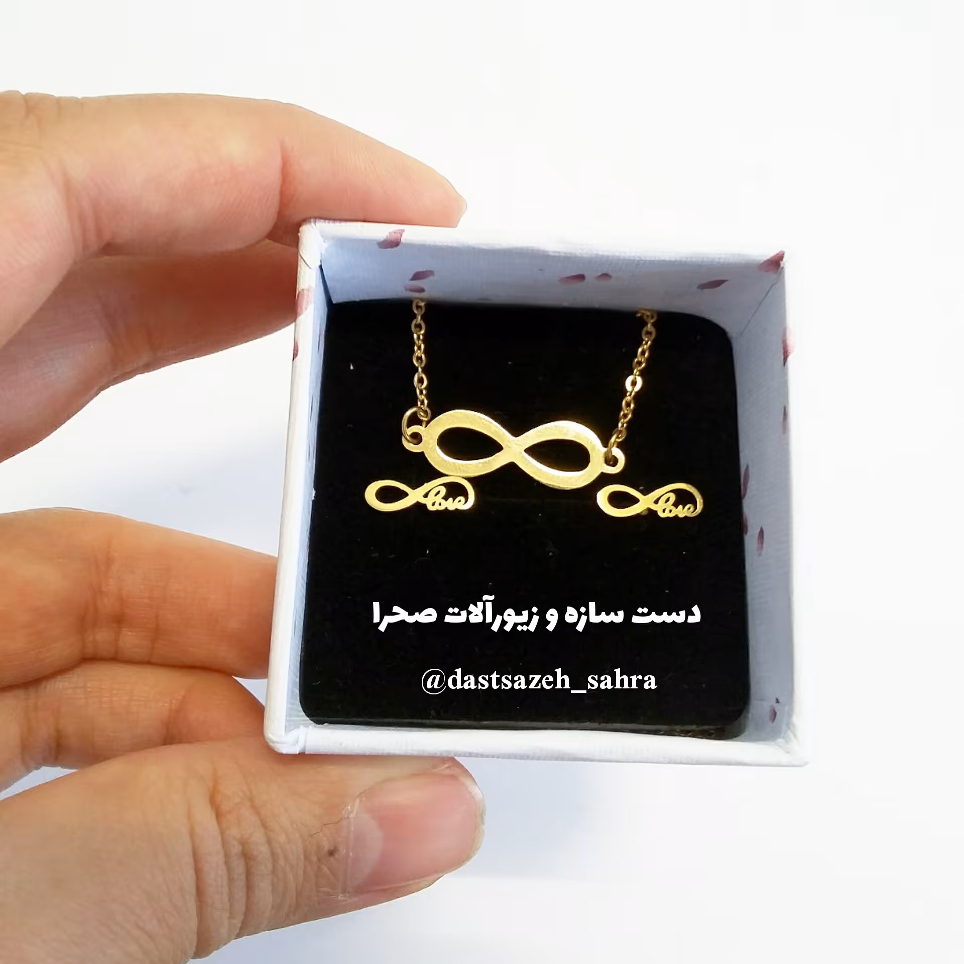 نیم ست گوشواره و گردنبند استیل طلایی طرح بی نهایت (گل گوش یا گوشواره میخی بی نهایت و گردنبند بی نهایت استیل طلایی)