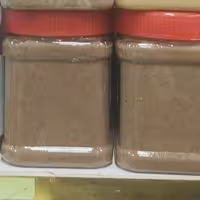 کره بادام زمینی شکلاتی با بادام  زمینی آستانه  450 گرمی