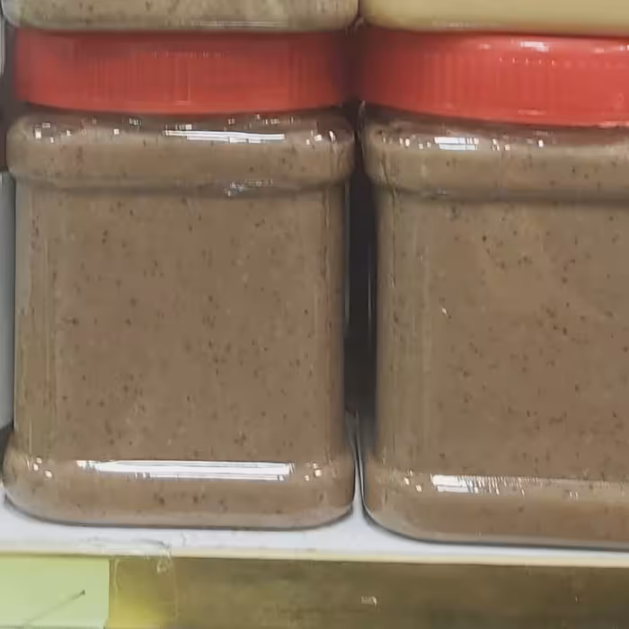 کره بادام زمینی شکلاتی با بادام  زمینی آستانه  450 گرمی